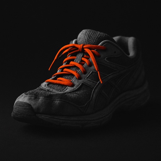 Running shoe with orange laces